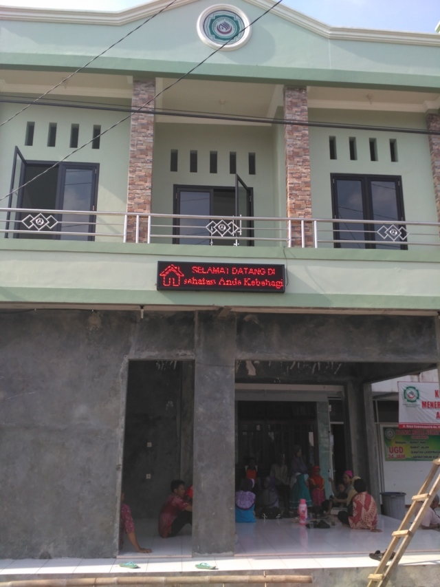 running text purwokerto